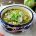 Pozole verde vegano hecho con setas guisadas en una caldo de pepitas, tomatillo, chiles y maíz pozolero. Acompañalo con aguacate y rábanos